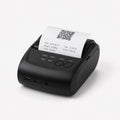 Voltix PocketOffice portable wireless printer printing a document